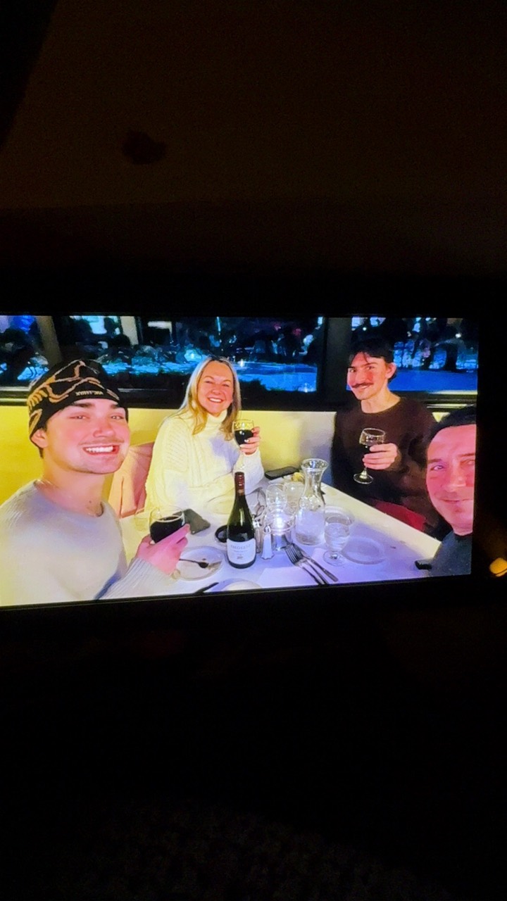 A family dinner, preserved in the photograph Alex supplied.